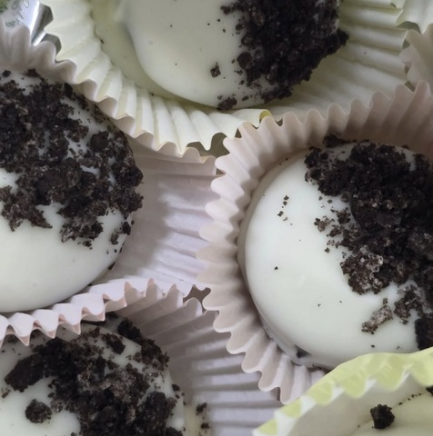 White chocolate dipped Oreos topped with Oreo crumble